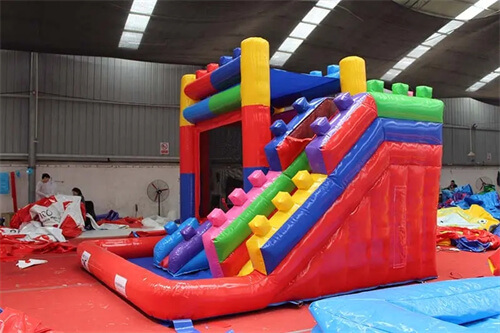 inflatable bounce house with water slide